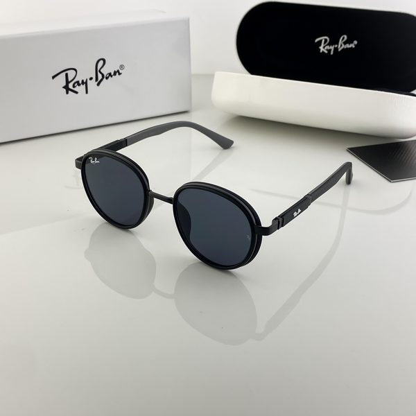 Ray-Ban Sunglasses Round Frame Black Lens are designed for those who value timeless elegance combined with everyday comfort. Crafted with precision, these sunglasses bring together the brand’s iconic heritage and modern trends, making them a versatile accessory for any wardrobe. Featuring a round black frame, this pair carries a minimalist yet bold character. The black dark lenses provide maximum sun protection while keeping your look sleek and understated. Whether you are heading out for a casual day, a drive, or a beach outing, these sunglasses elevate your appearance instantly. 🔑 Key Features: Brand: Ray-Ban Frame Style: Round Frame Color: Black Lens Color: Black (Dark) Gender: Unisex – suitable for both men and women Material: Premium metal-acetate blend ✨ Why Choose Ray-Ban Round Sunglasses? Ray-Ban has been a global leader in eyewear for decades, representing luxury, functionality, and unmatched style. The round frame is a symbol of vintage charm that remains evergreen in the fashion world. This model effortlessly combines durability and comfort, ensuring you can wear them all day without strain. These sunglasses feature UV-protective lenses that shield your eyes from harmful sun rays while giving you a sharp, clear vision. The lightweight yet sturdy construction ensures long-lasting wear, making it an excellent investment for style-conscious individuals. 🎯 Styling Tips: Pair with casual denim and a plain tee for a cool off-duty look. Match with a blazer or semi-formal outfit for effortless sophistication. Perfect companion for beachwear, summer vacations, and daily commutes. 📦 Packaging: Each pair comes with a normal protective box. For those who want an elevated unboxing experience, we also offer an additional premium box option available at extra cost. ✅ Conclusion: If you are looking for a stylish, versatile, and durable sunglass that works across all occasions, the Ray-Ban Sunglasses Round Frame Black Lens is a perfect choice. A true blend of classic and modern fashion, this pair is ideal for both men and women who want to stand out with elegance.